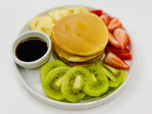 Panqueques con fruta y salsa a elección para compartir de Alta Pinta