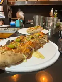 Producto de Pizzeria los compadres
