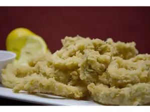Rabas con fritas y salsa de Confiteria La Palma