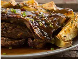VACIO A LA MOSTAZA AL HORNO CON GUARNICION de KALABANA RestoBAR