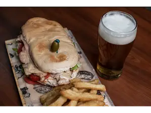 Lomo de pollo con papas de LA TRANQUERA