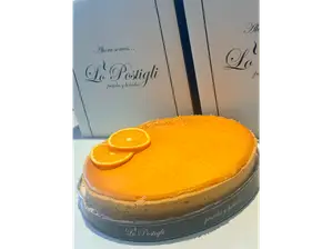 Tarta de queso y naranja de Lo postigli Valle Escondido