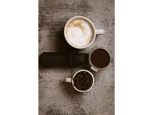 Cafe con leche de Lo Postigli Centro Pasteleria y Helados