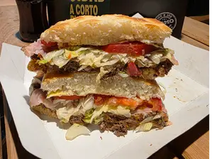 PIZZA MUZZA 4 porciones de LosLomitos pico truncado