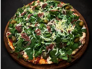 Rúcula y jamon crudo de Pizzotas