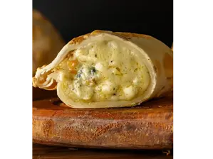 Empanada de cuatro quesos de Presto empanadas y pizzas