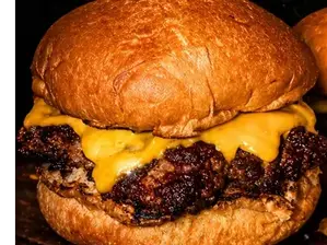 Cheese Raptor de Rex Burger